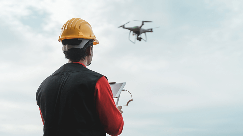 Surveying the site using a drone.